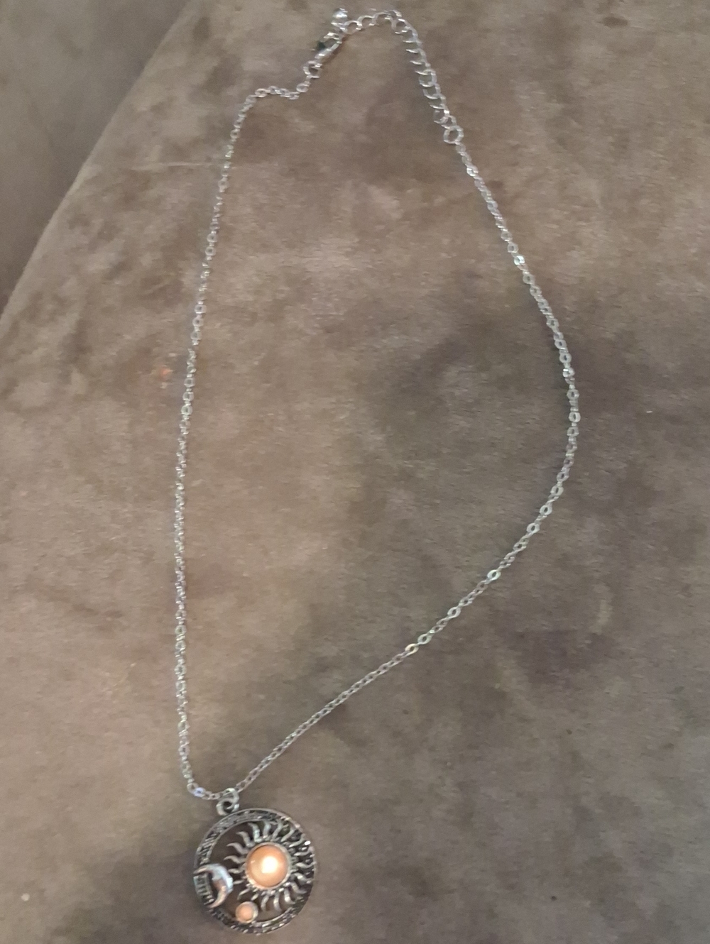 Silver Sunburst Pendant Necklace with Peach Accent